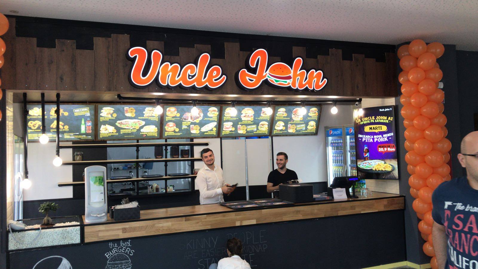 Sistem Digital Signage pentru meniuri digitale Uncle John